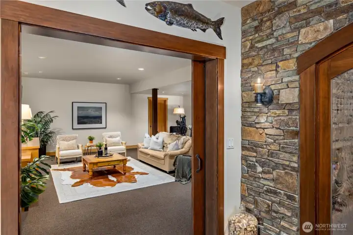Large family room adjoining the wine cellar. So many possibilities!