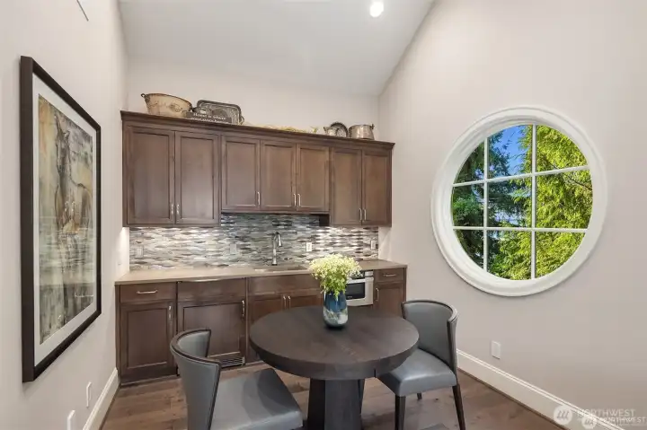 A bonus room complete with its won bistro bar creates the perfect "hangout" for relaxing. A bonus room complete with its won bistro bar creates the perfect "hangout" for relaxing.