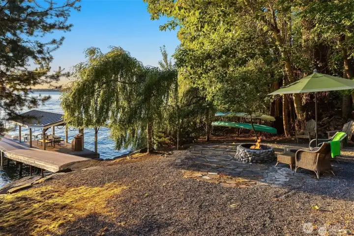 Enjoy this sweet beach and easy water access for kayaking, paddleboarding, swimming and evening bonfires. Enjoy this sweet beach and easy water access for kayaking, paddleboarding, swimming and evening bonfires.