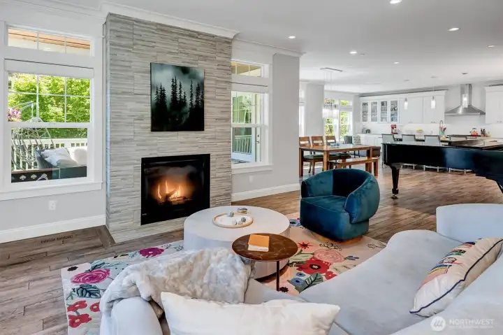 Gas fireplace, great flow to dining and kitchen. Gas fireplace, great flow to dining and kitchen.