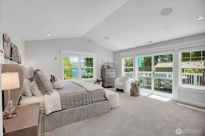 Dreamy Primary bedroom with vaulted ceiling, Smart home blinds and lighting. Dreamy Primary bedroom with vaulted ceiling, Smart home blinds and lighting.