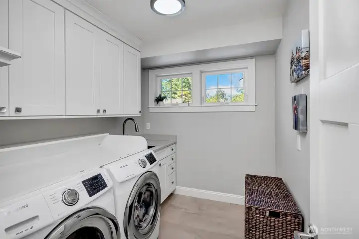Laundry room upstairs has utility sink. Laundry room upstairs has utility sink.
