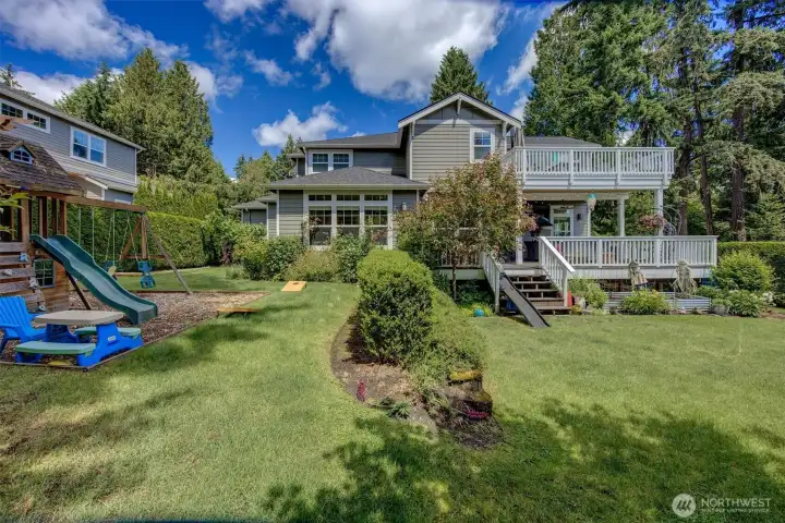 Playset stays with the Property! Beautiful grass play yard. Garden is bird and butterfly friendly, designed by Michael Muro. Playset stays with the Property! Beautiful grass play yard. Garden is bird and butterfly friendly, designed by Michael Muro.