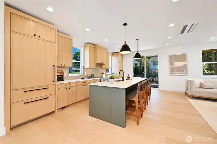 The stunning chef's kitchen anchors the main level. The stunning chef's kitchen anchors the main level.