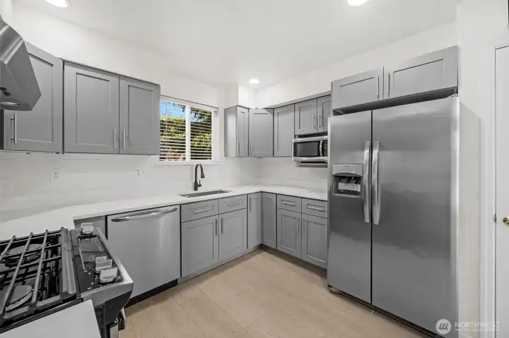 Freshly remodeled kitchen, new stainless steel appliances.