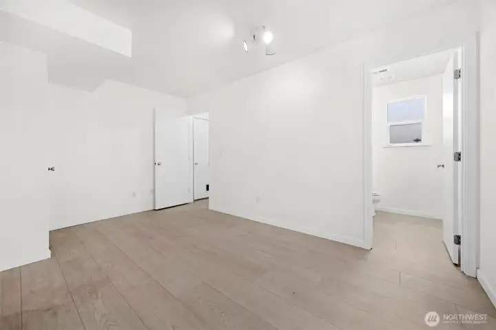 Dining room looking into half bathroom and laundry room entrances