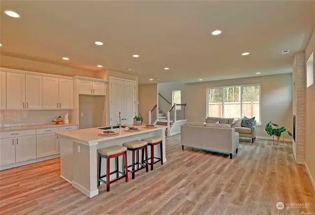 Photos are of similar home built by this Builder and are for illustration purposes only to reflect layout and typical finishes. May depict seller enhancements. Colors and options may vary.