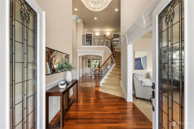 Entry foyer with soaring ceiling and gorgeous chandelier (that lowers for easy cleaning).