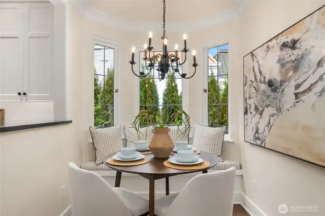 Cozy breakfast table area with built-in seating.
