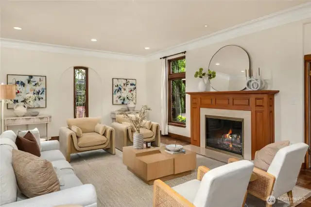 Anchored on the West wall by a handsome fireplace.