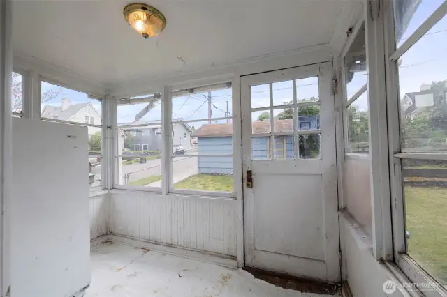 Mud room in rear entry freezer conveys
