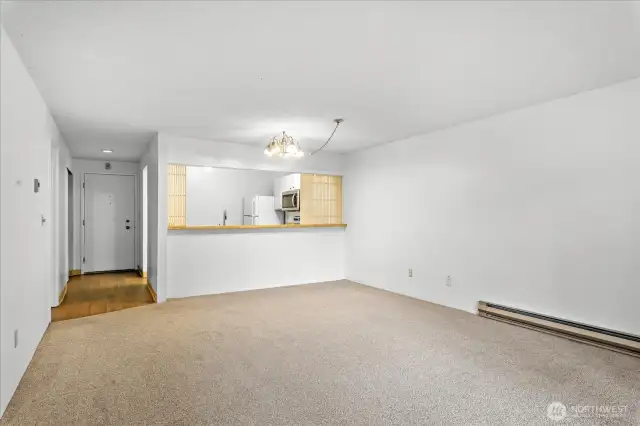 Open concept living space- new carpet in 2023