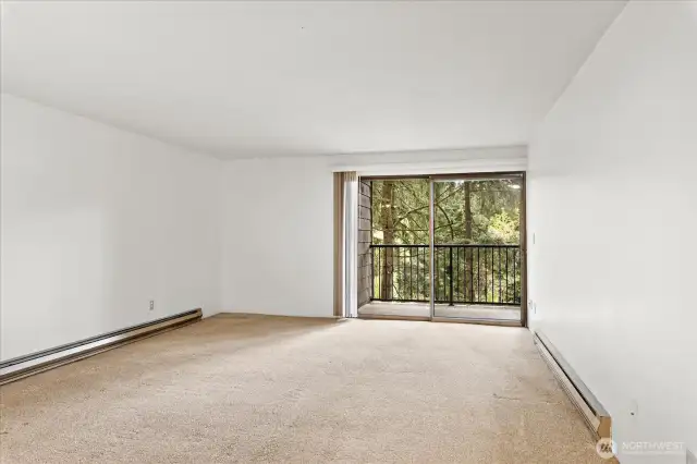 Open concept living space- new carpet in 2023