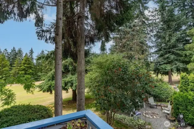 Sliding doors open to beautiful deck & view to the course.