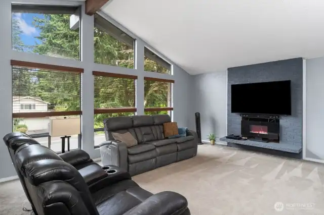 Large windows let the light in & provide a warm relaxing space.