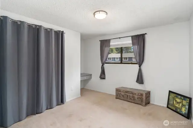 3rd upstairs bedroom with built in desk/vanity
