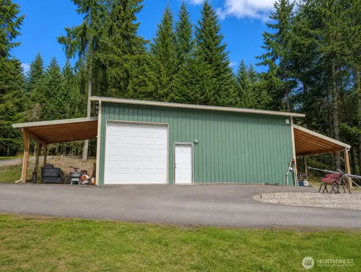 36'6"x24' = 876sf Detached shop with 2 mini splits for A/C & Heat. plus 2 carports at each end of the shop.