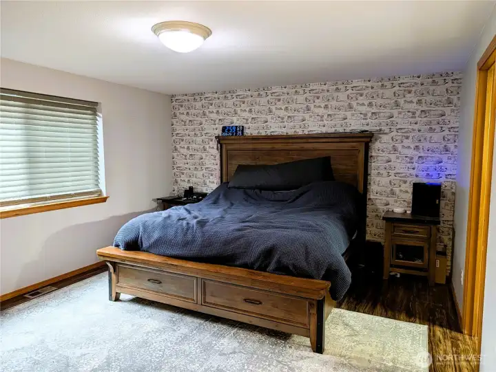 Main floor primary bedroom with walk in closet