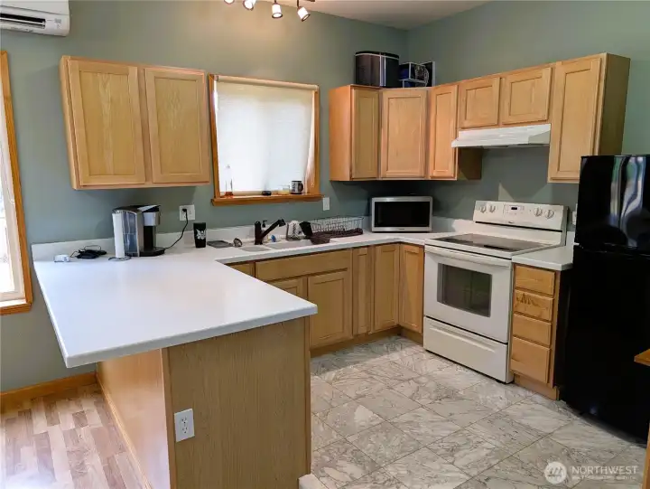 ADU - Generous kitchen with Corian countertops