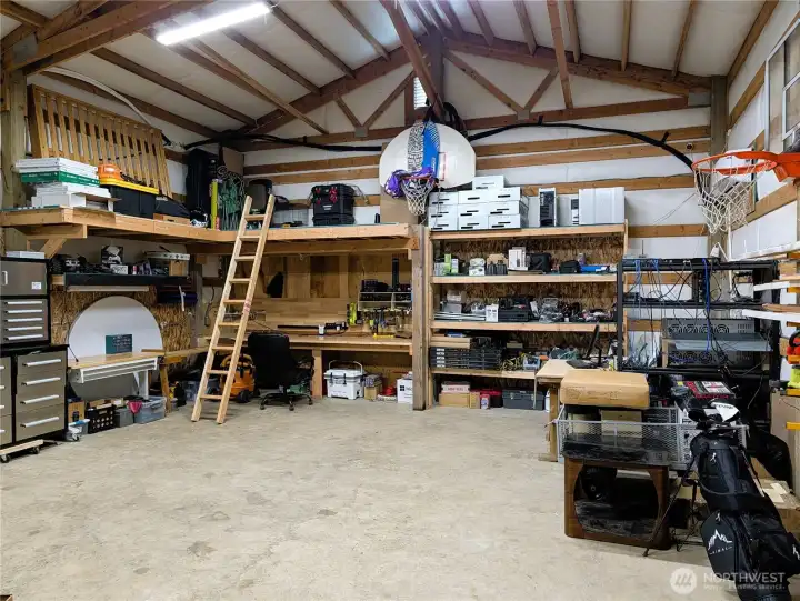 36'6"x24' = 876sf Detached shop with 2 mini splits for A/C & Heat. plus 2 carports at each end of the shop.