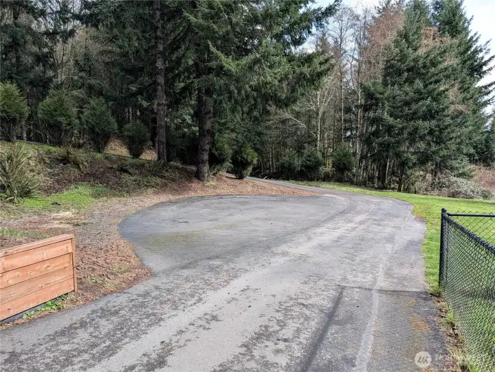 Blacktop driveway and parking