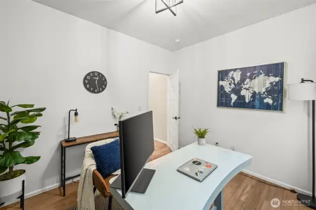 Additional home office/den option with modern wall design, perfect for flex space in this Black Diamond home.