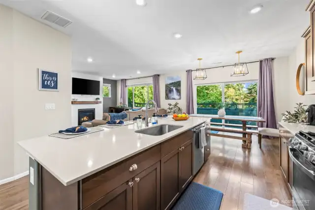 Kitchen flows seamlessly into the living room, creating the heart of this Black Diamond home.