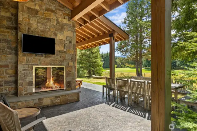 Outdoor fireplace with TV