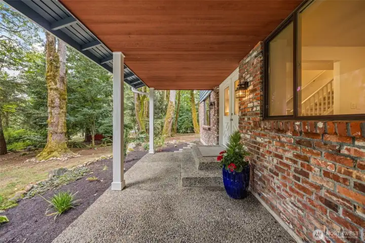Spacious and welcoming, the front porch offers a grand entrance, a secondary mudroom entrance and room to sit back, enjoy the fresh air, and relax.