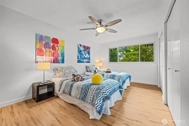 The fourth bedroom also has a larger than life closet! This room is huge! It overlooks the front yard and trees.