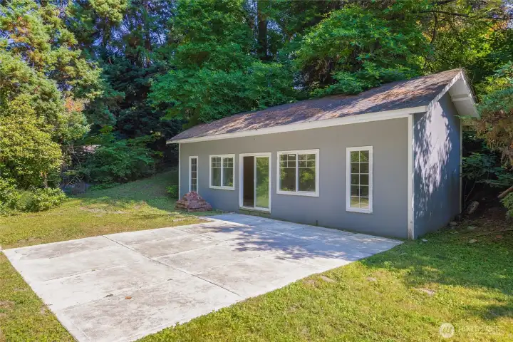 Additional non-conforming creekside studio with electricity.