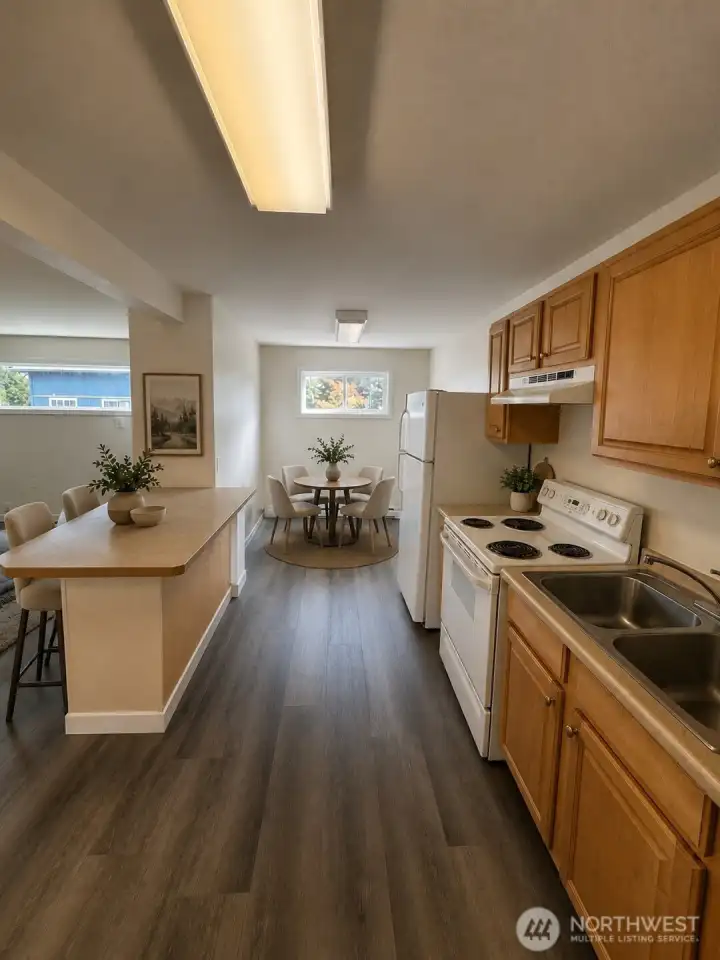 Kitchen with breakfast nook, virtually staged Kitchen with breakfast nook, virtually staged