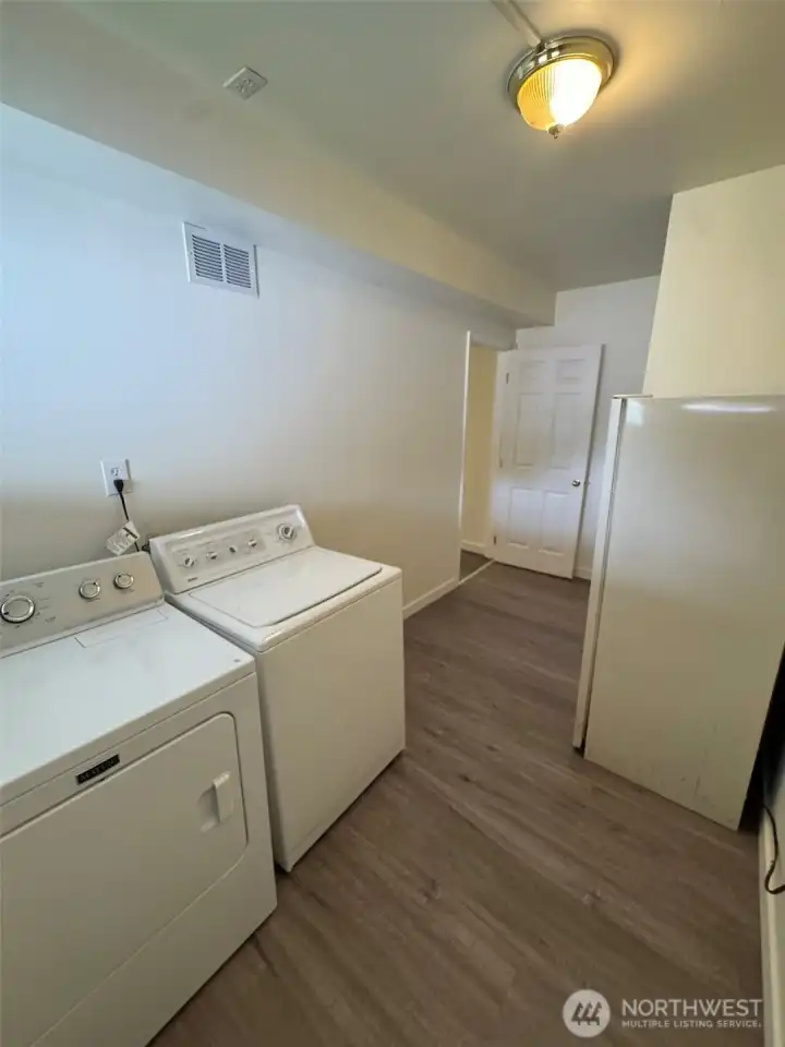 Laundry room - washer, dryer & fridge stay