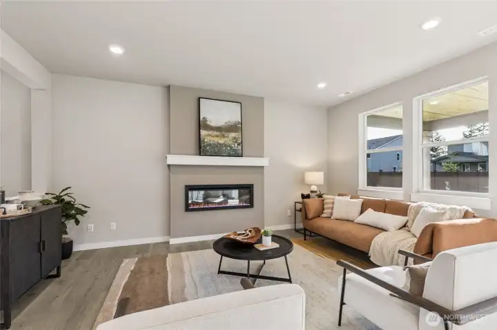 oversized great room, with access to backyard and views of the Mt through the multiple windows.