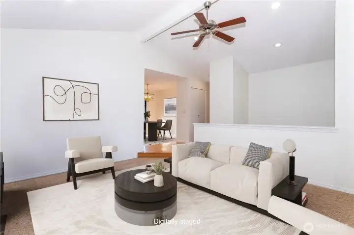 Virtually staged living room, looking into the dining area