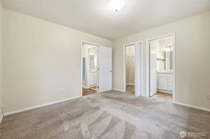 Primary bedroom with walk in closet