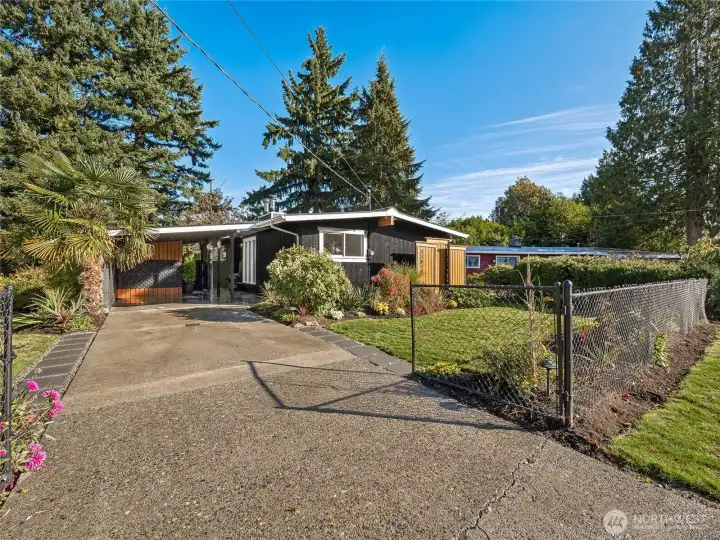 Fully fenced yard, freshly painted moderm exterior, driveway parking for 2–3 cars or RV parking.