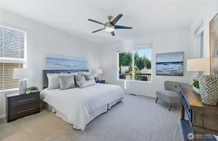 King sized Primary suite w/spa-like bath that includes a duel sink vanity, step-in shower, private water closet and large walk-in closet with organizers