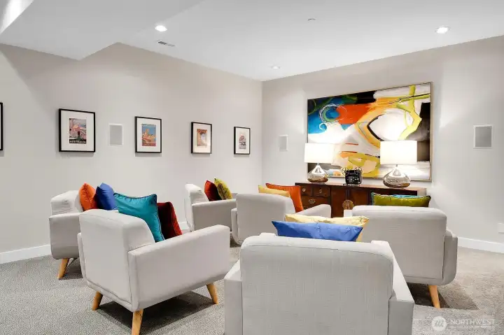 Heavily insulated media room complete with surround sound and movie lighting.