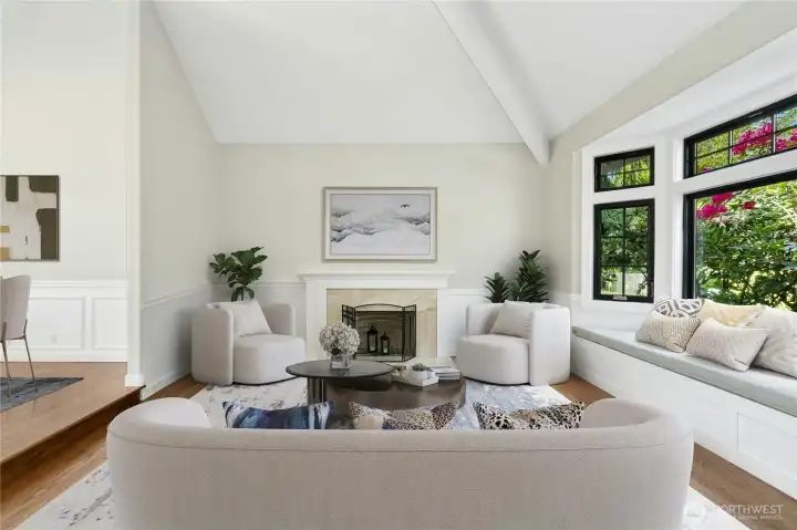 Vaulted ceilings in the living room and the grand piano can stay if you would like it.