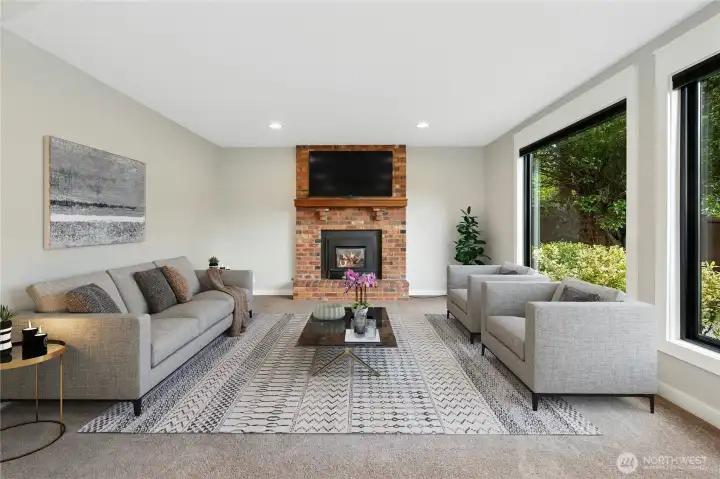 This fun family room will be a place to create memories and relax by the gas fireplace.