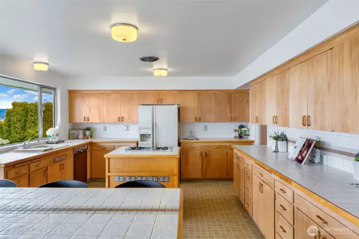 Unlike many homes of the era, this one offers an expansive kitchen that opens to the view.