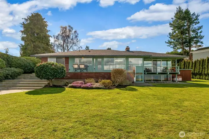 The large, level lawn offers room for games, tents, celebrations, and all kinds of outdoor gatherings.