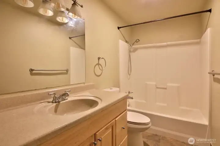 Full bath on hall.