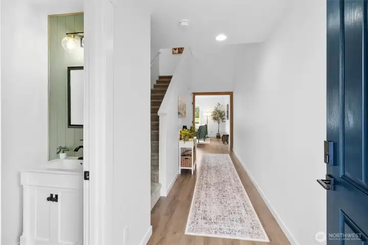 Entry with half bath to left
