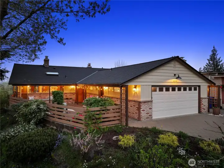 Perched above it all, this charming mid-century modern retains it's character and exudes charm with recent refresh. One-level with full daylight basement home. Paver driveway and inviting front patio with garden lighting. Oversized two-car garage, now roof, exterior paint, all surfaces washed and scrubbed. She's been to the beauty parlor!