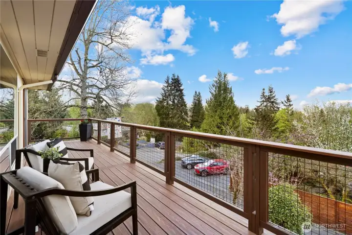 View deck spans nearly the full width of the home, perfect for entertaining and sunsets.