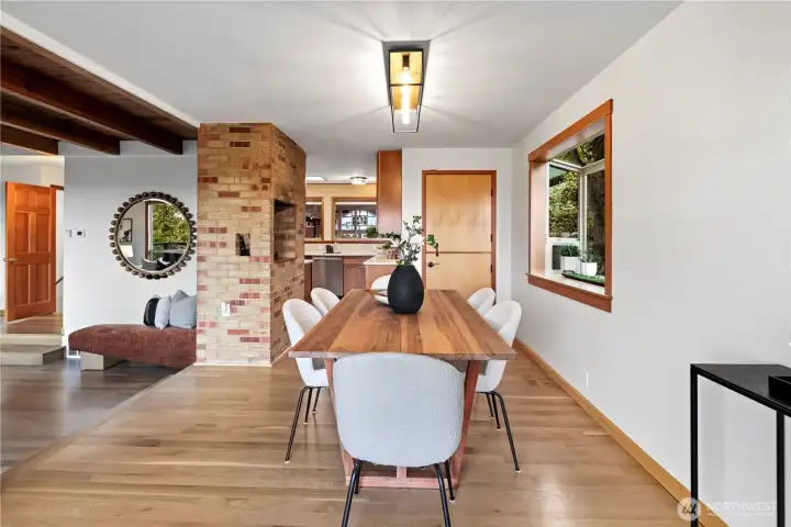 Dining room looking back toward the kitchen and the step-down living room on the left.