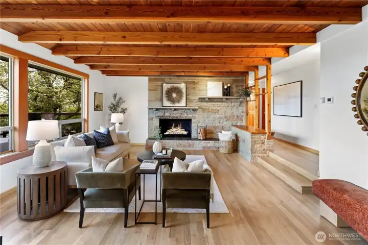 Warmth, character, and charm. Ready for your next chapter. Creative open shelving display and bench seat by the hallway. It's wrapped with stone on both sides.