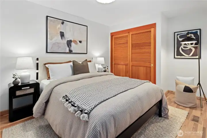 Bedroom right off the entry. Could be an office or bedroom. Spacious and would accommodate a small desk or dresser in the right corner.